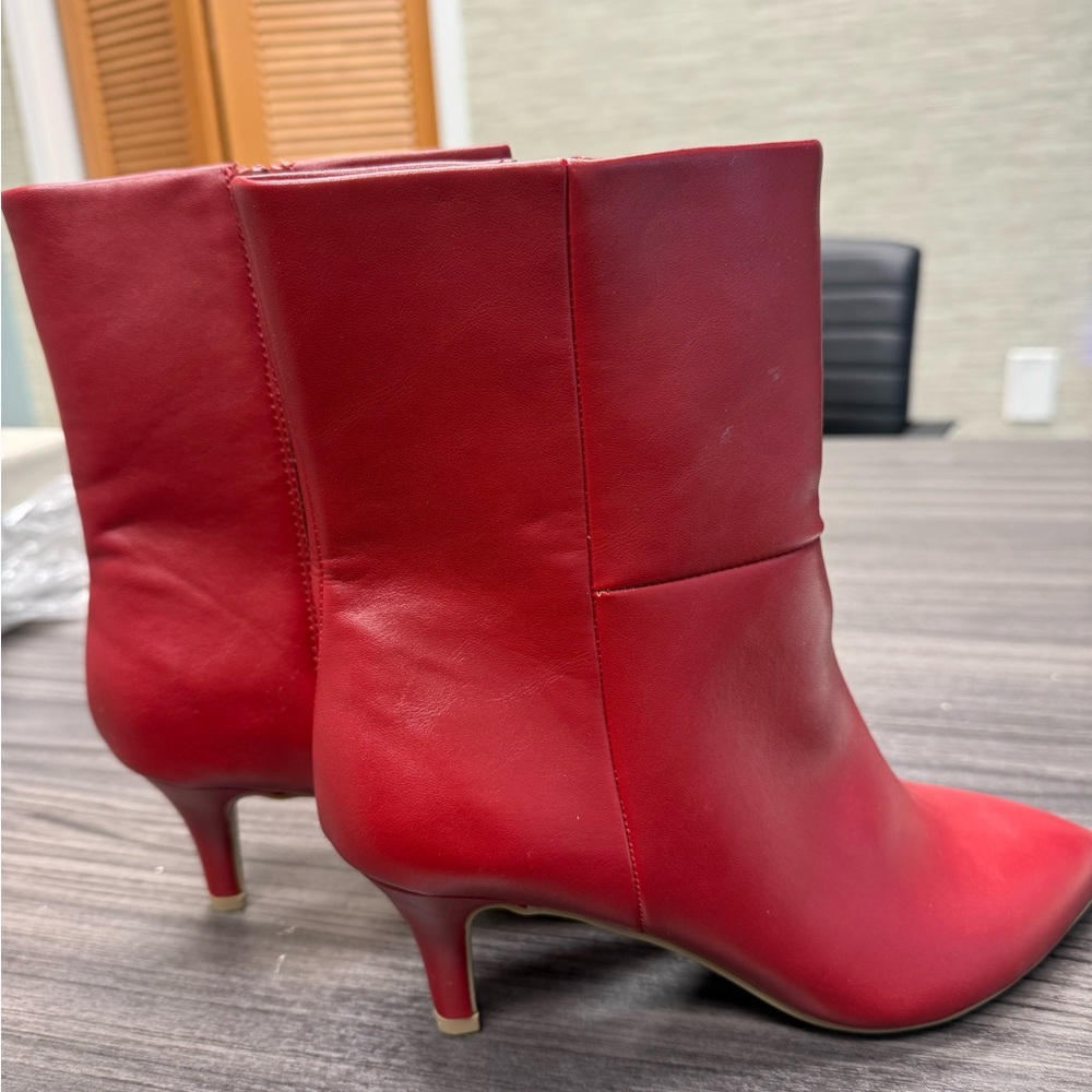 NWOT. DV by Dolce Vita Red Heeled Boots. Size 7.